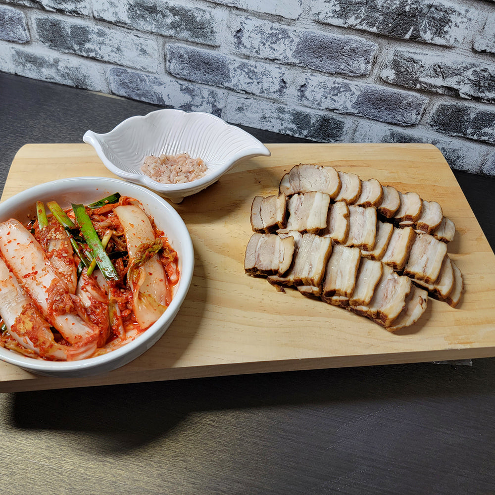 Close-up view of Bossam (Korean steamed pork belly wrap set) | Banchan365