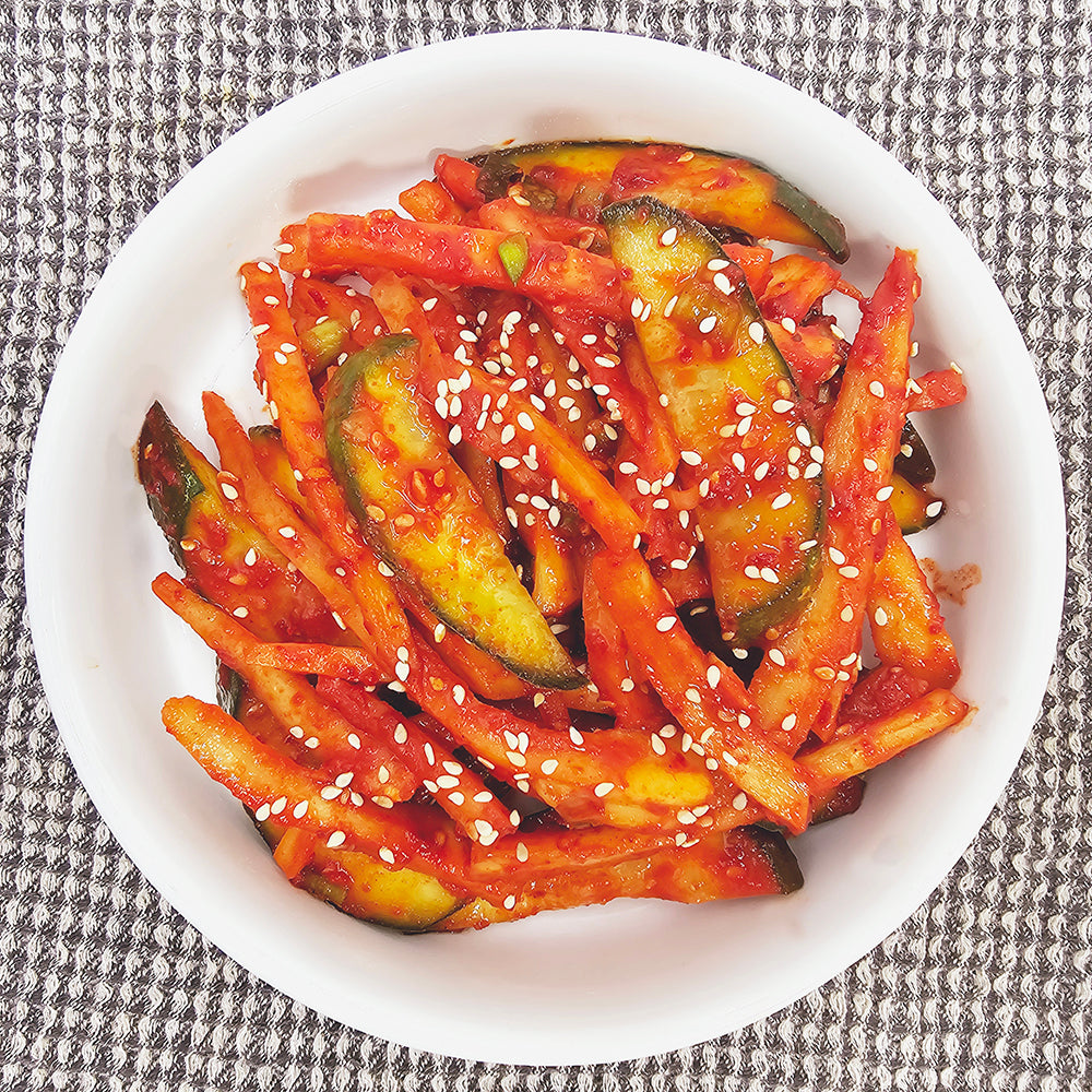 Oi doraji-muchim (Korean cucumber and balloon flower root salad) – small family size served and plated | Banchan365