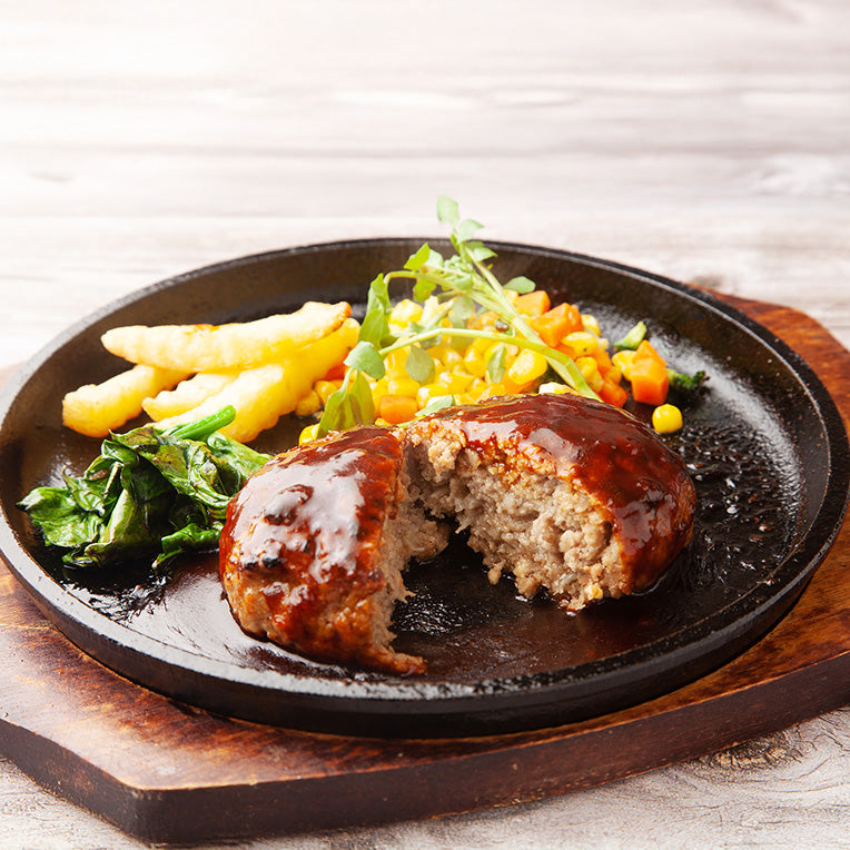 Close-up view of Hambak-seuteikeu (Korean-style hamburger steak) – housemade | Banchan365