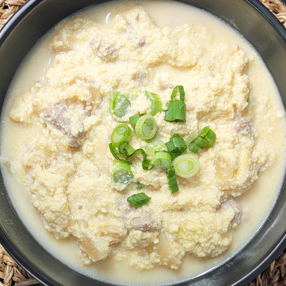 Kongbiji-jjigae (Korean ground soybean stew with pork) served and plated | Banchan365