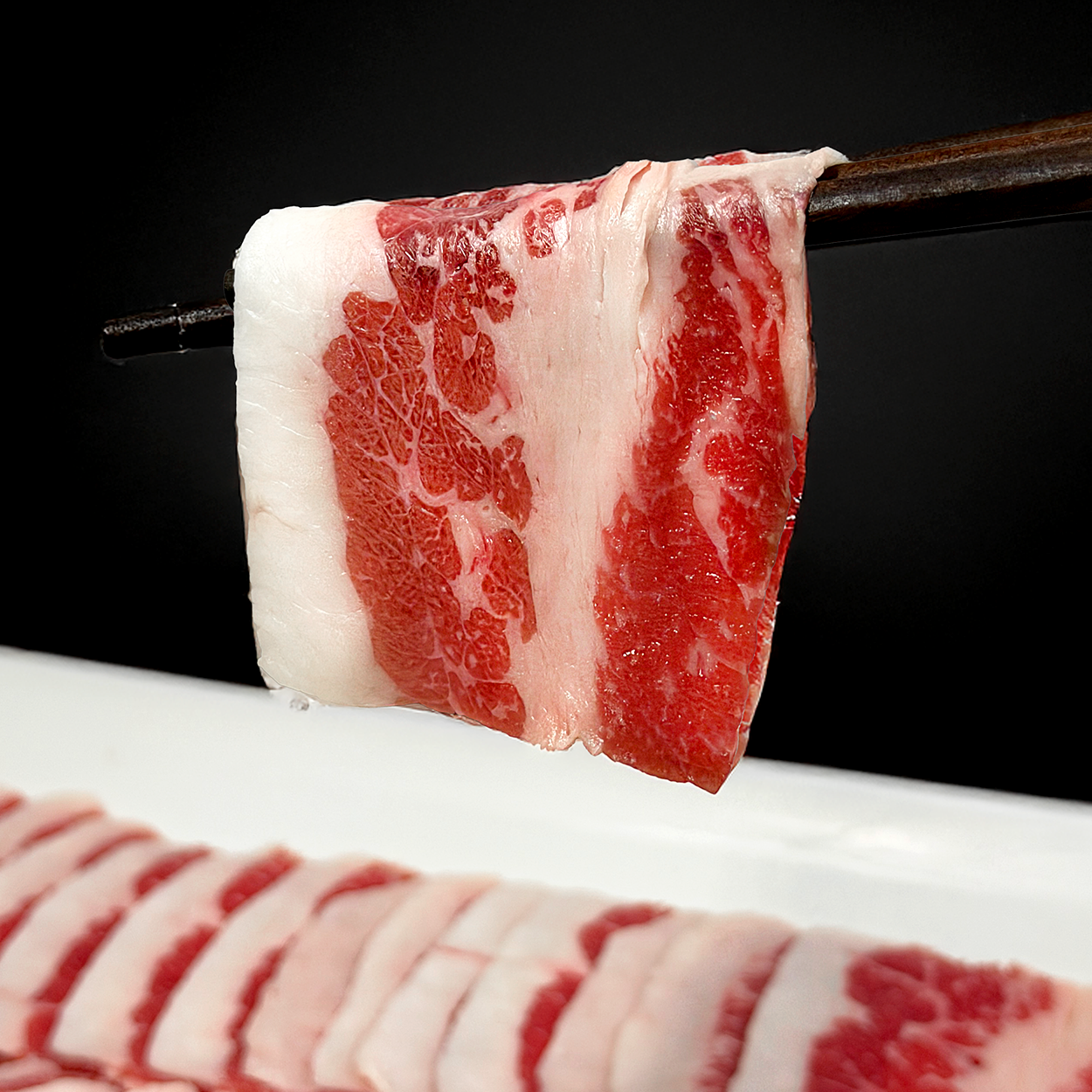 Close-up view of Angus chadolbaegi (Korean-style sliced beef brisket) – 1 lb | Banchan365
