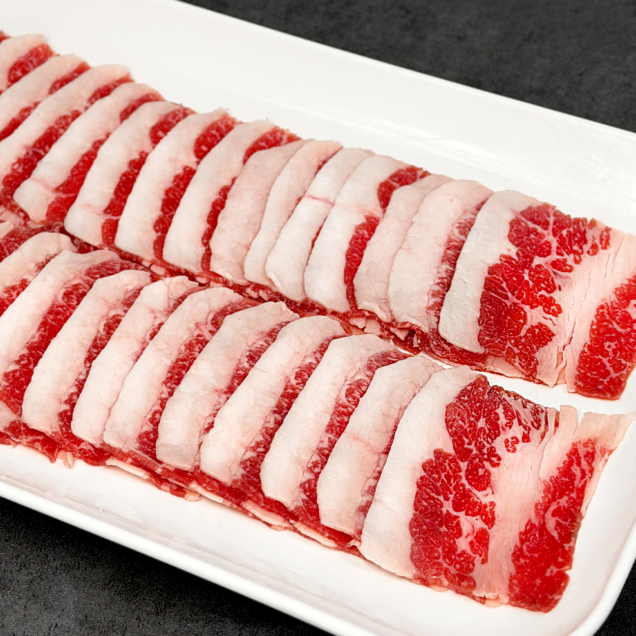 Angus chadolbaegi (Korean-style sliced beef brisket) – 1 lb – packaged for delivery | Banchan365