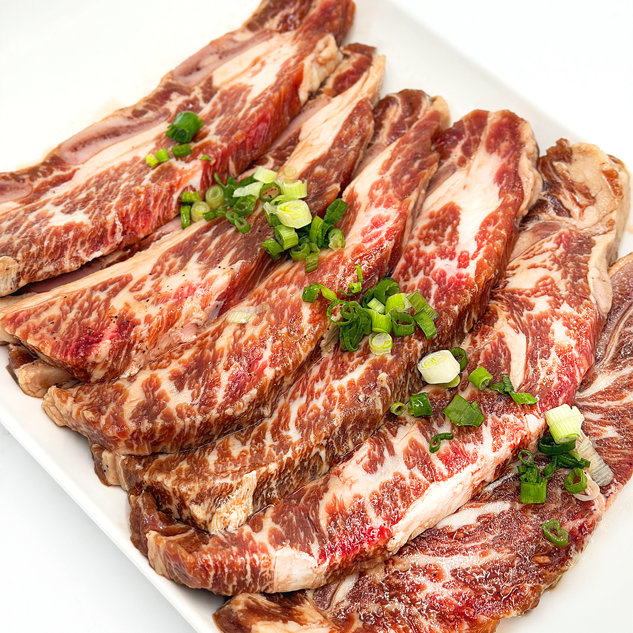 LA galbi (Korean LA-style marinated short ribs) – Angus 2 lb served and plated | Banchan365