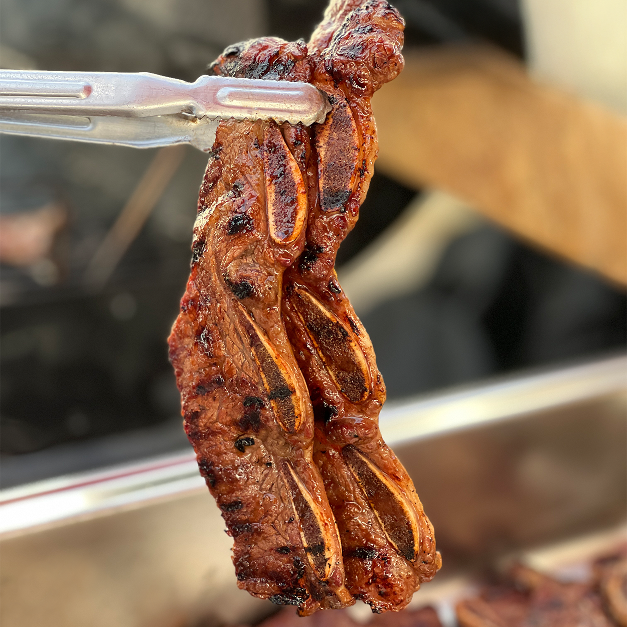 Close-up view of LA galbi (Korean LA-style marinated short ribs) – Angus 2 lb | Banchan365