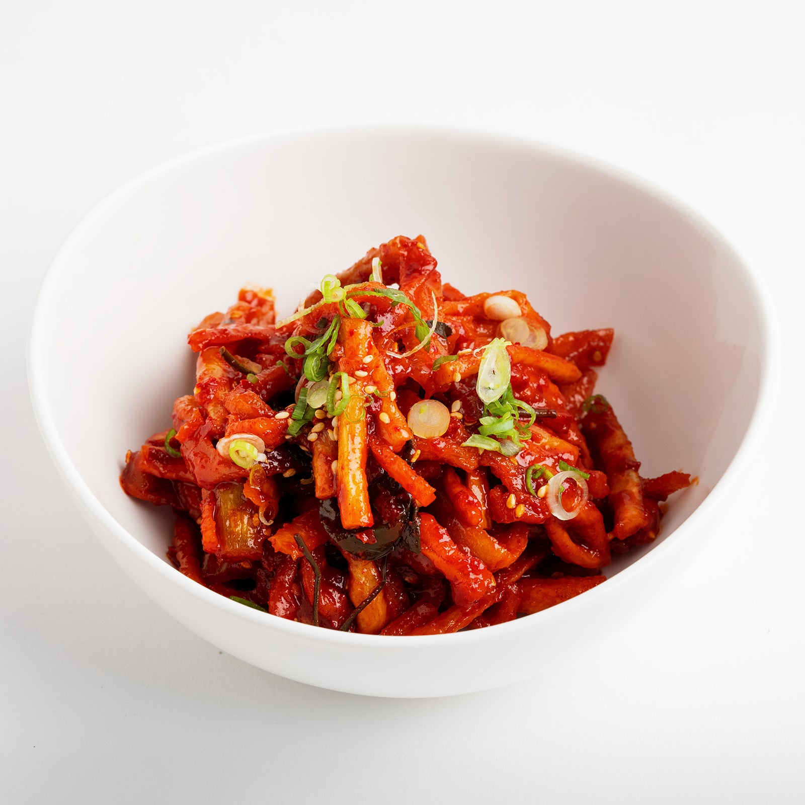 Close-up view of Mumallaengi-muchim (Korean seasoned dried radish salad) – small family size | Banchan365