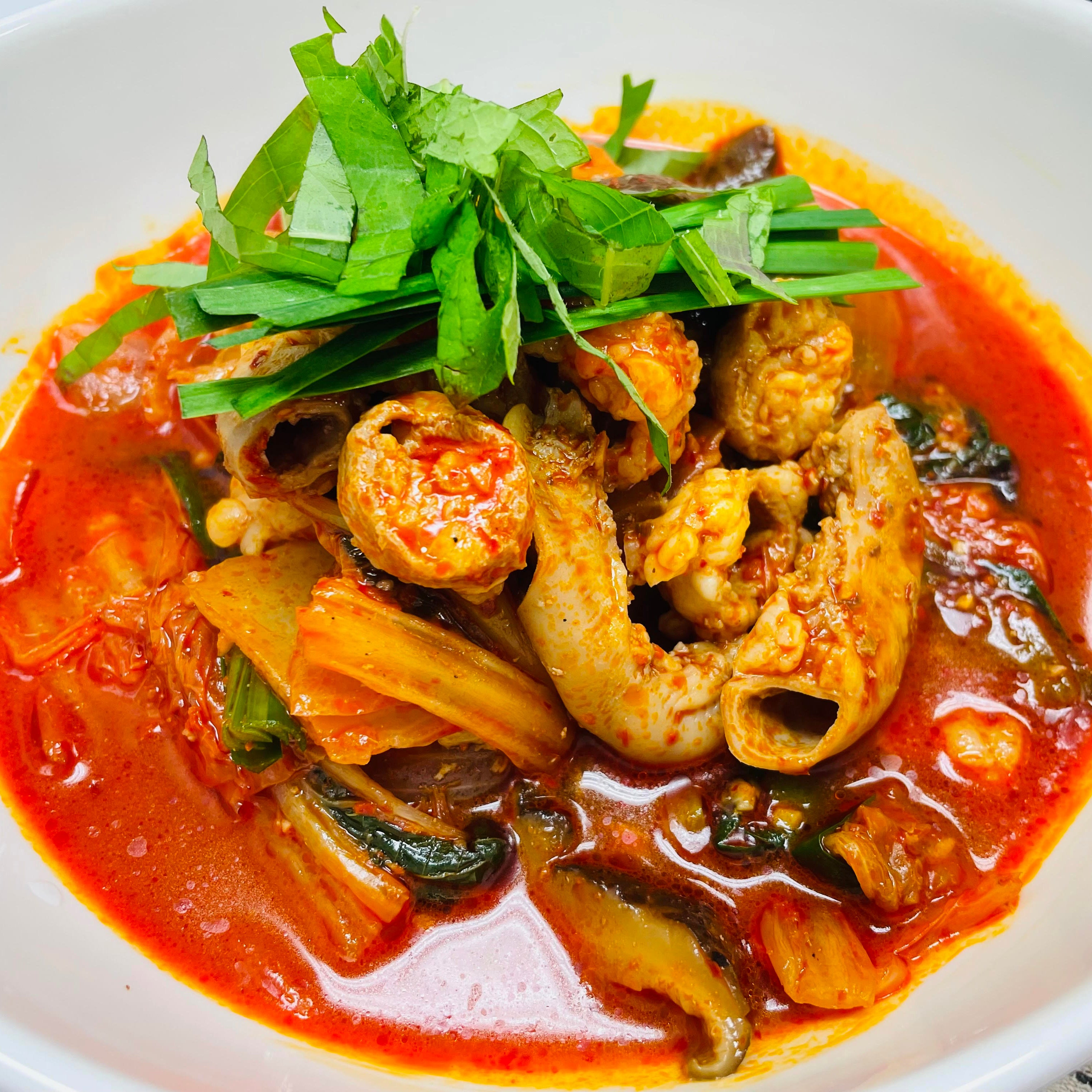 Gopchang-jjigae (Korean beef tripe stew) served and plated | Banchan365