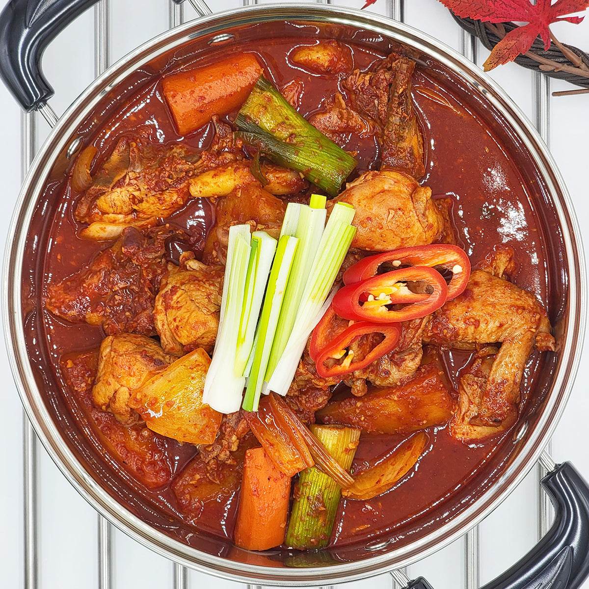 Dakbokkeumtang (Korean spicy braised chicken stew) served and plated | Banchan365