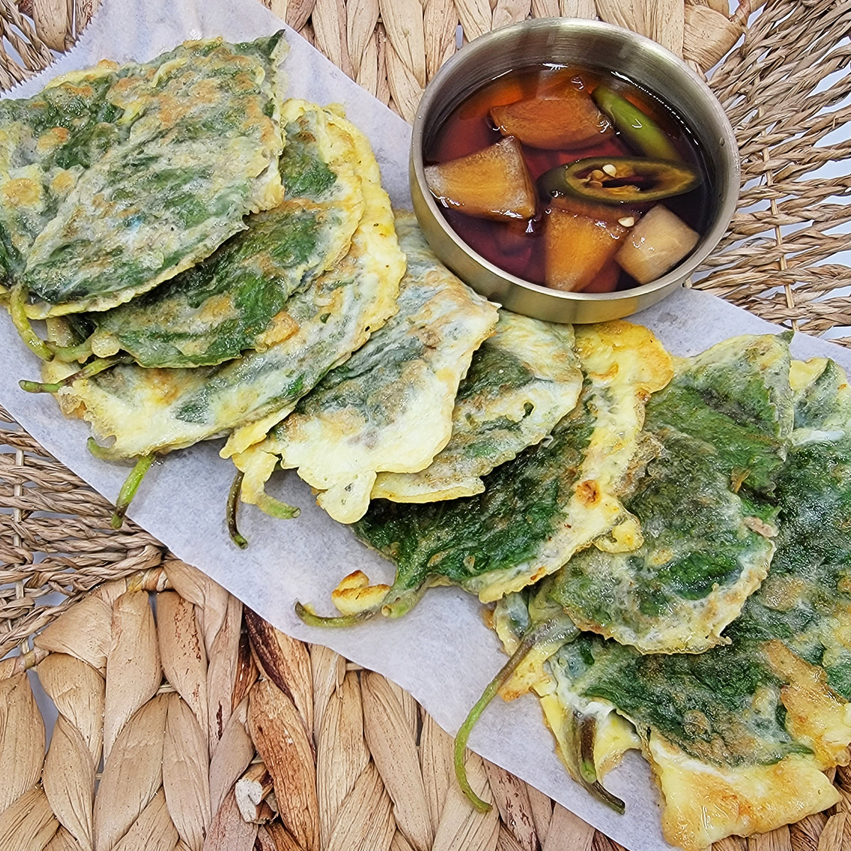 Close-up view of Kkaennip-jeon (Korean stuffed perilla leaf pancake) | Banchan365