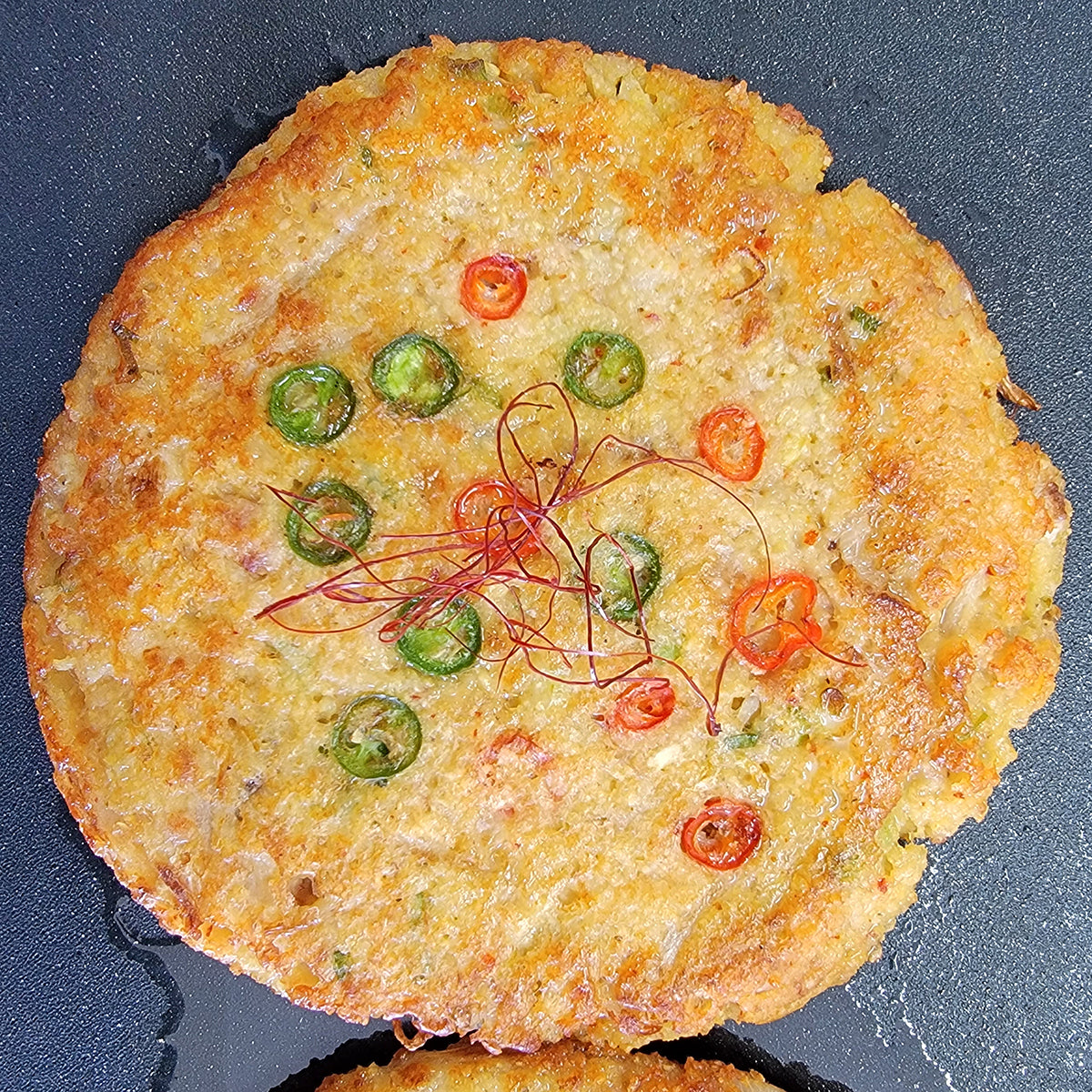 Nokdu-jeon batter (Korean mung bean pancake mix) served and plated | Banchan365