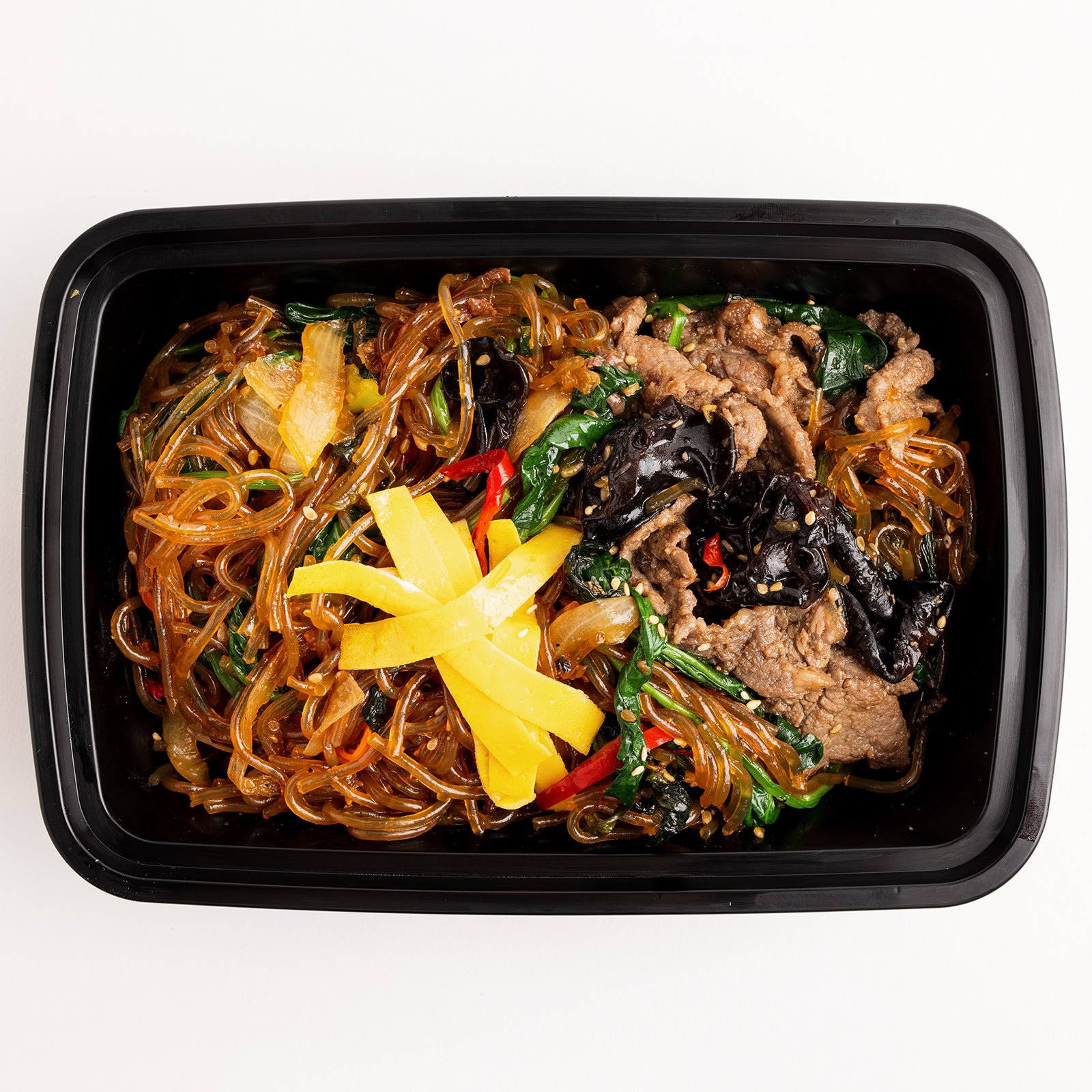 Close-up view of Sogogi japchae (Korean glass noodle stir-fry with beef) – 3 servings | Banchan365