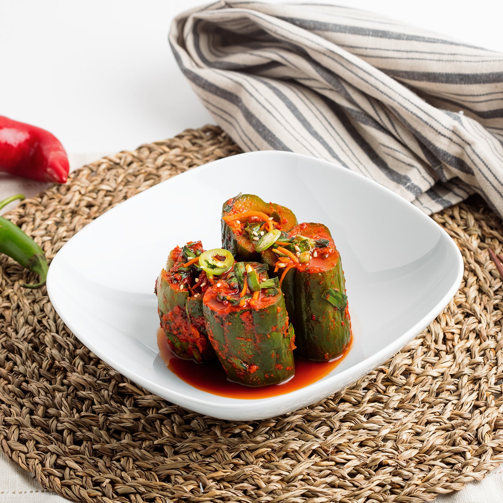 Oi-sobagi (Korean stuffed cucumber kimchi) served and plated | Banchan365