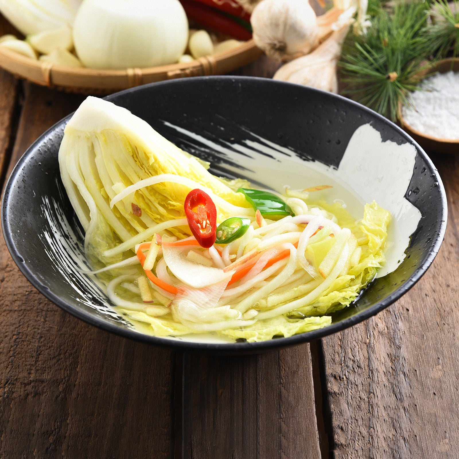 Close-up view of Baek-kimchi (Korean white kimchi, non-spicy) | Banchan365