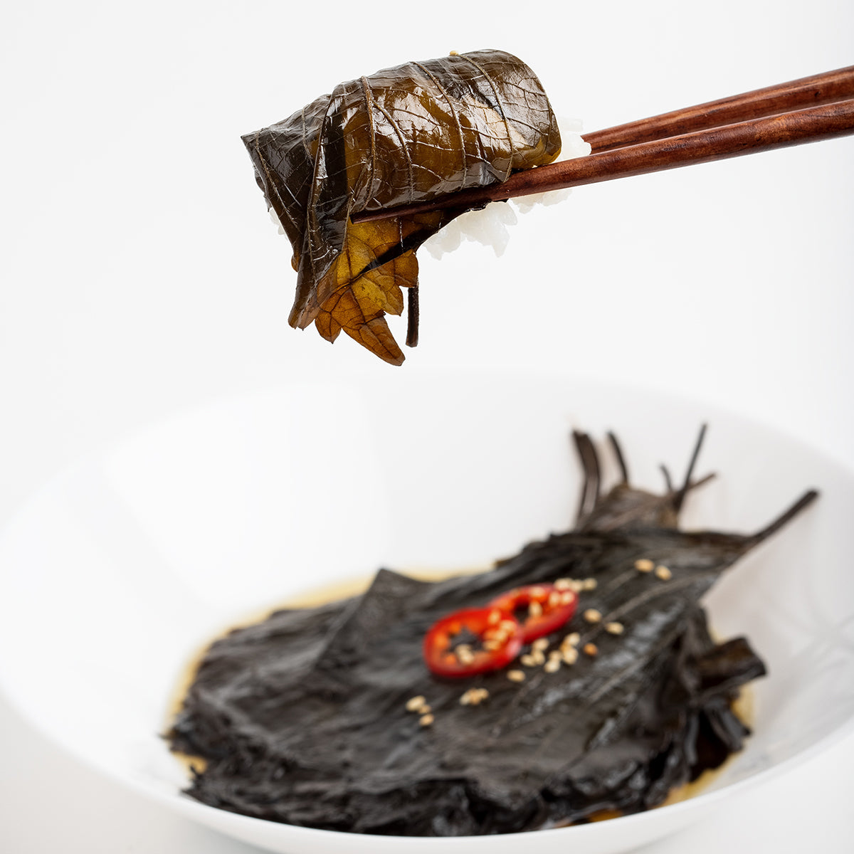 Close-up view of Ganjang kkaennip-jeorim (Korean soy-marinated perilla leaves) – large size | Banchan365