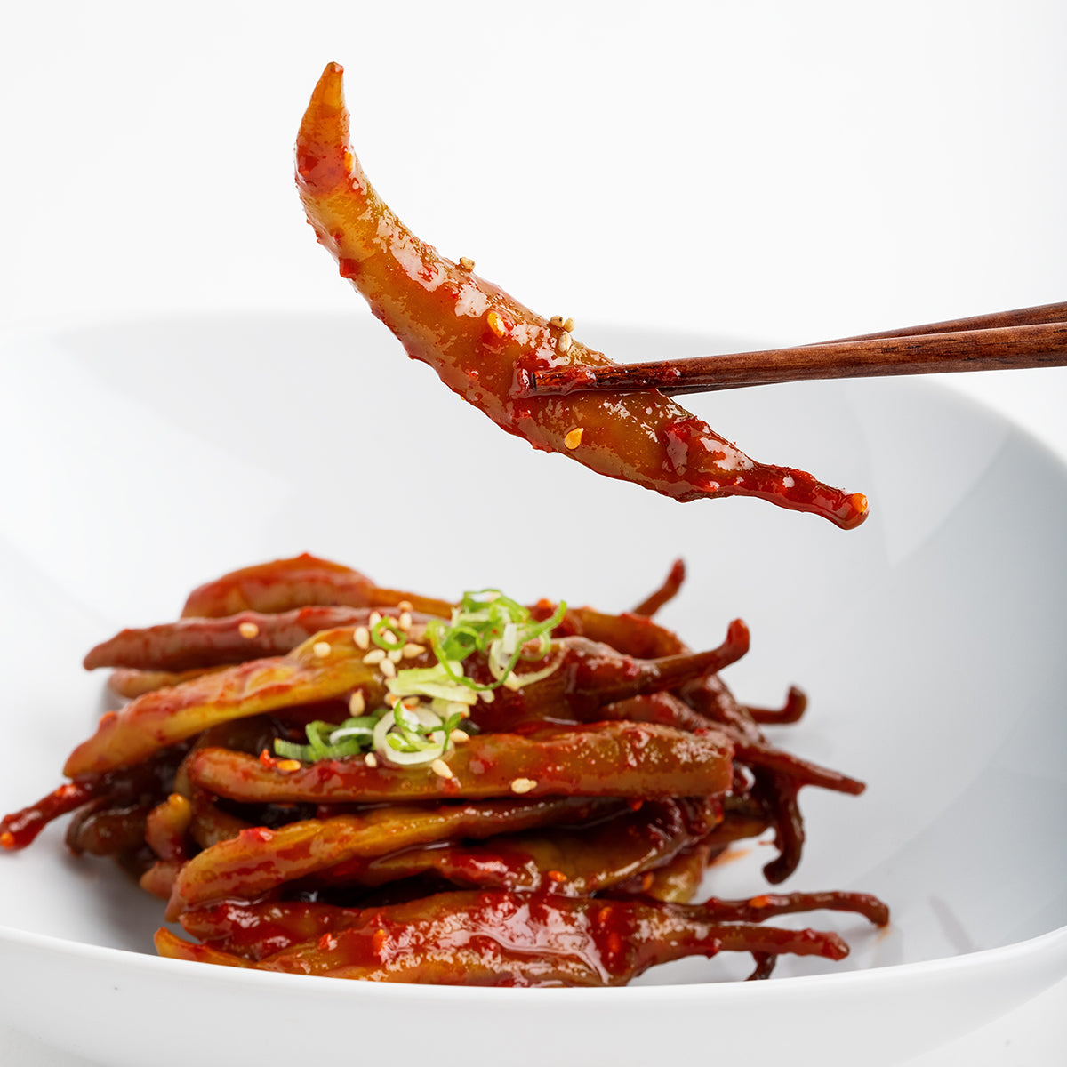 Close-up view of Gochu-jangajji (Korean pickled chili pepper) – small family size | Banchan365