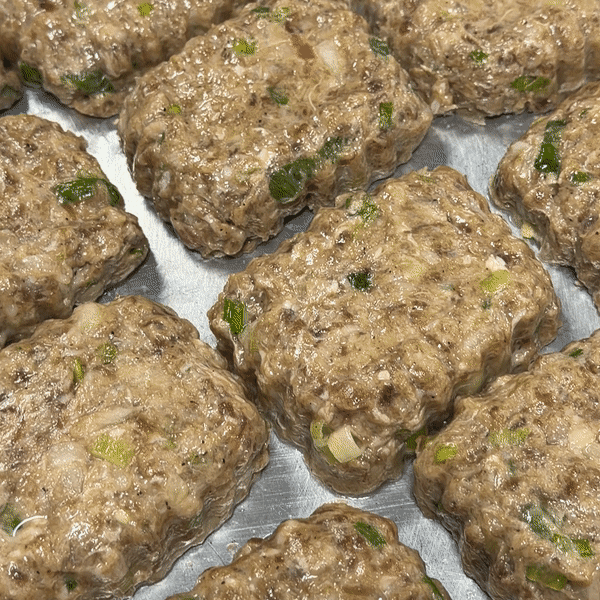 Uncooked Songjeong-style Korean beef and pork tteokgalbi patties before cooking | Banchan365