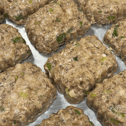Uncooked Songjeong-style Korean beef and pork tteokgalbi patties before cooking | Banchan365