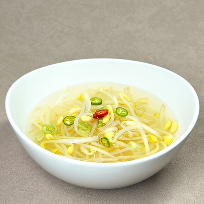 Close-up view of Kongnamul naengguk (Korean chilled bean sprout soup) | Banchan365