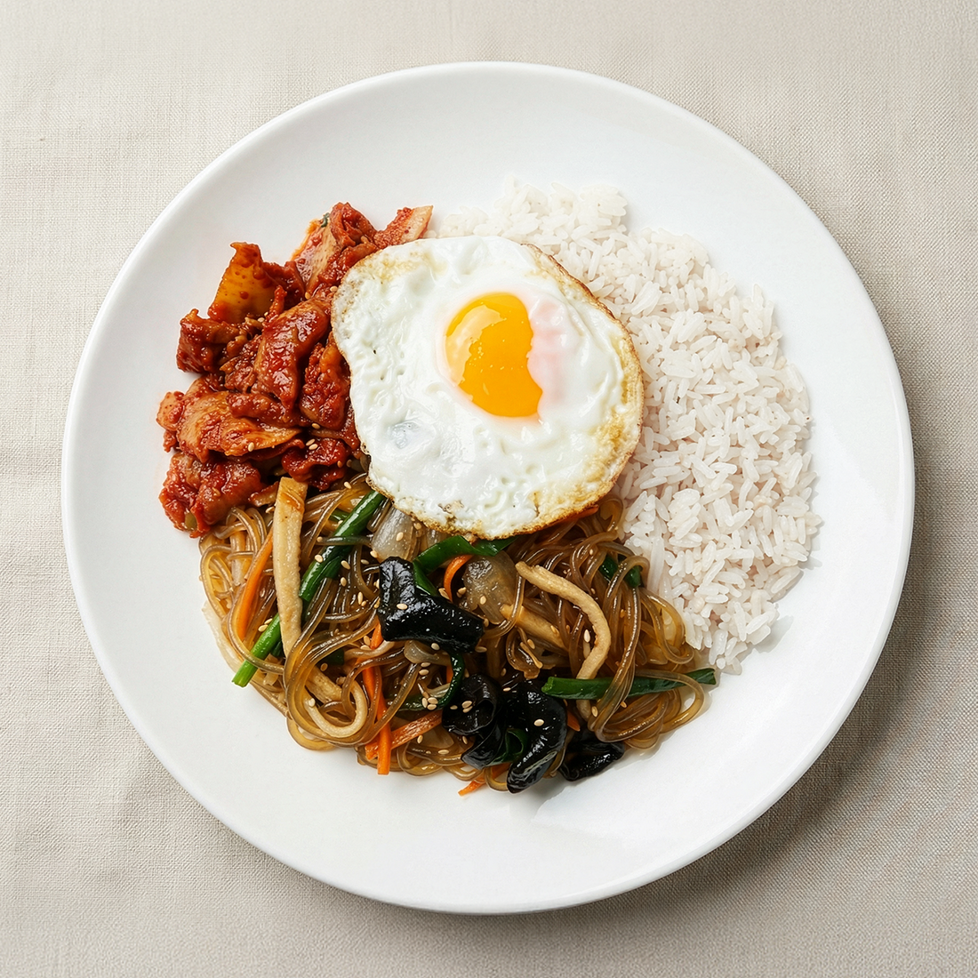 Close-up view of Korean japchae rice bowl frozen lunchbox – glass noodle | Banchan365