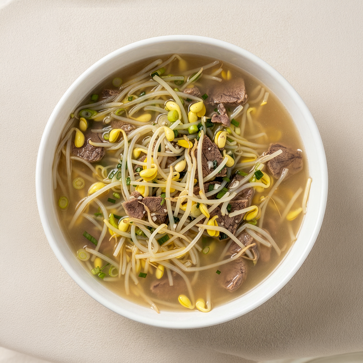 Overhead view of Korean beef and soybean sprout soup | Banchan365