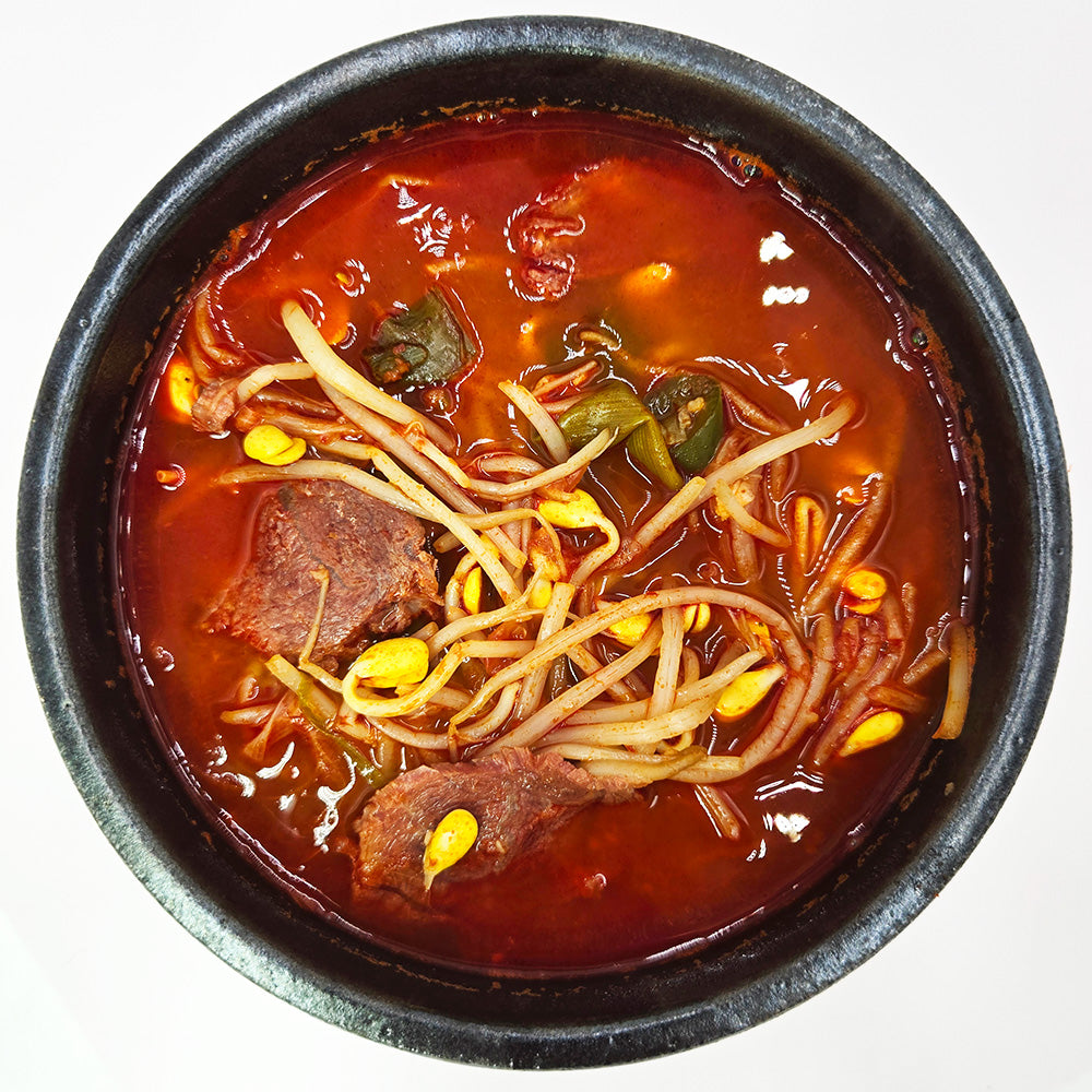 Close-up view of Eolkeun sogogi gukbap (Korean spicy beef rice soup) | Banchan365