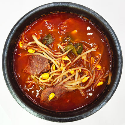 Close-up view of Eolkeun sogogi gukbap (Korean spicy beef rice soup) | Banchan365