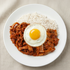 Close-up view of Korean spicy squid and pork rice bowl frozen lunchbox | Banchan365