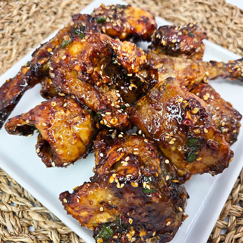Close-up view of Kodari-gangjeong (Korean sweet and sour half-dried pollack) | Banchan365