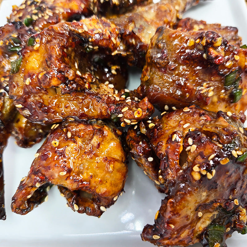 Kodari-gangjeong (Korean sweet and sour half-dried pollack) served and plated | Banchan365