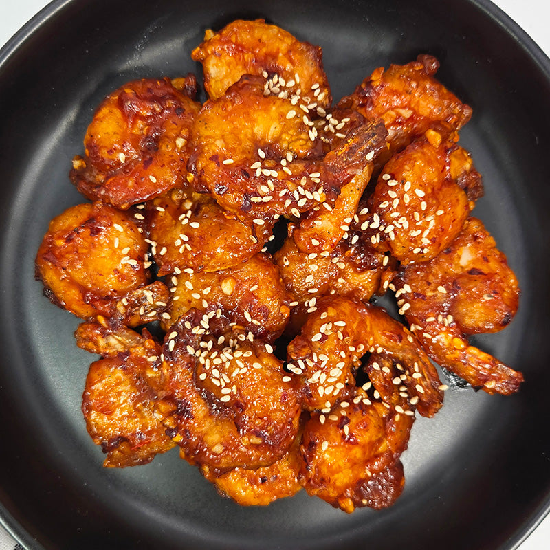 Close-up view of Chili saeu-bokkeum (Korean chili shrimp stir-fry) | Banchan365