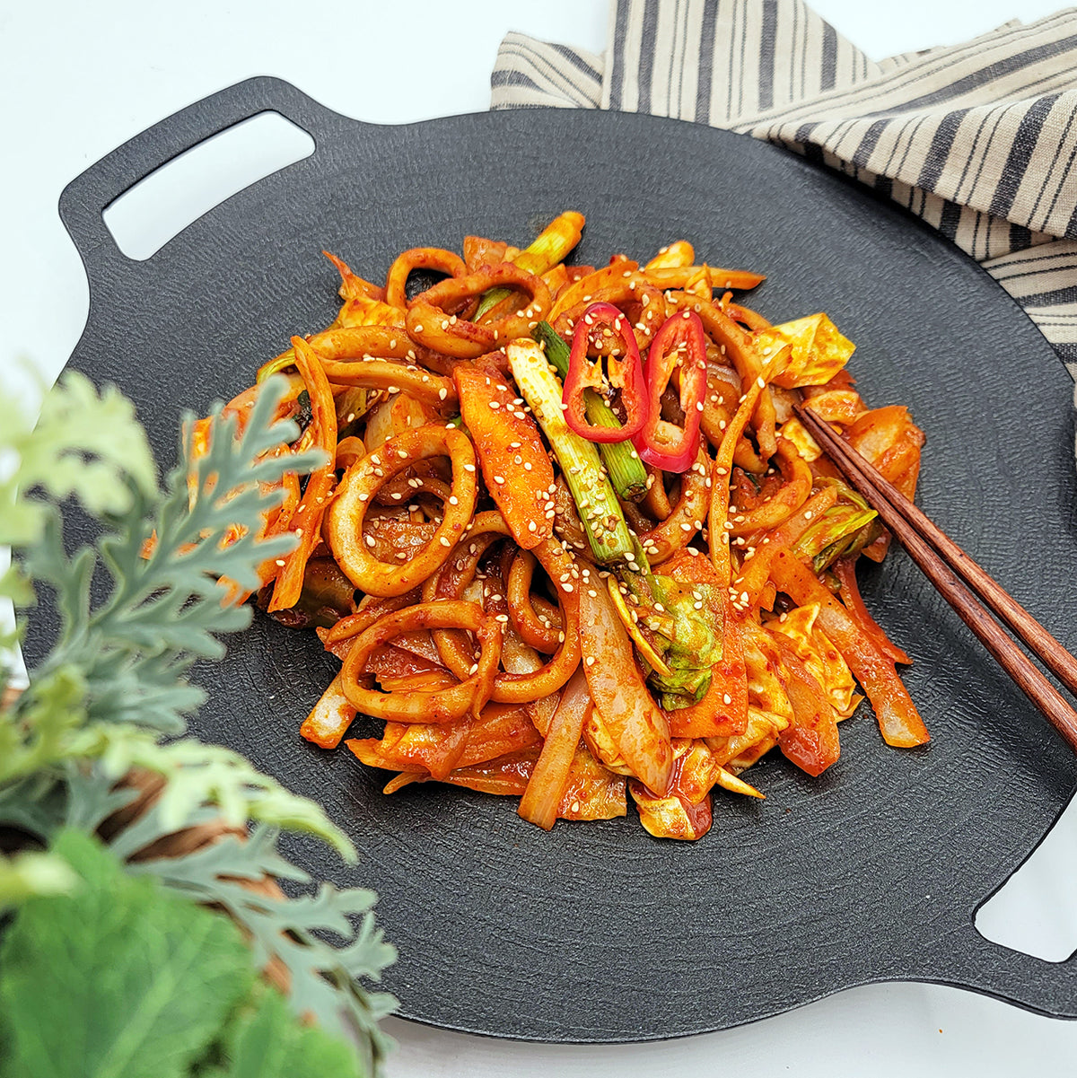 Close-up view of Ojingeo-bokkeum (Korean spicy stir-fried squid) – 1.5 lb | Banchan365